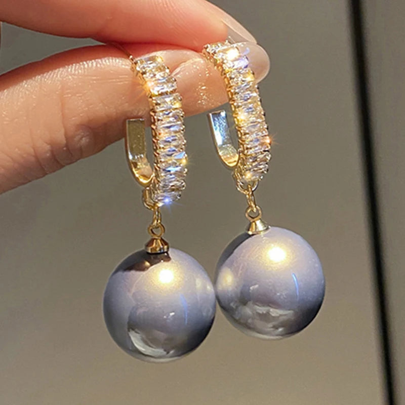 Deelia Pearl Dangle Earrings